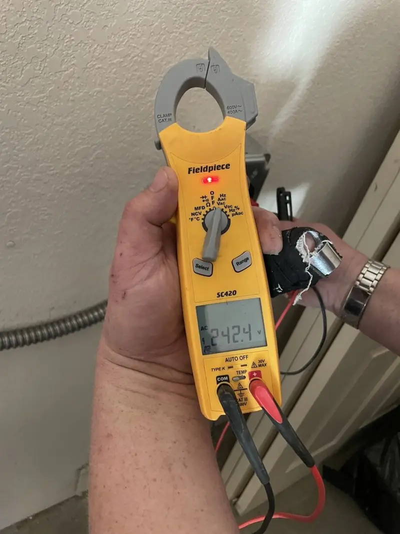 Voltage testing with clamp meter during Hot Tub / Pool Electrical Wiring in Boscawen